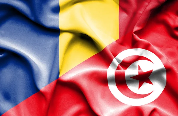 Waving flag of Tunisia and Romania — Stock Photo, Image