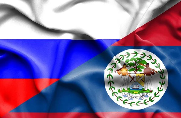 Drapeau agitant de Belize et de Russie — Photo