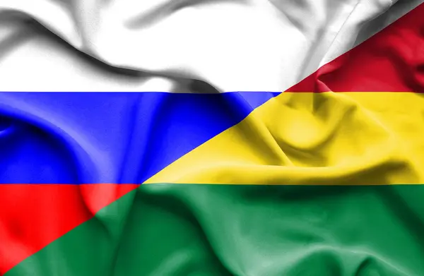 Waving flag of Bolivia and Russia — Stock Photo, Image