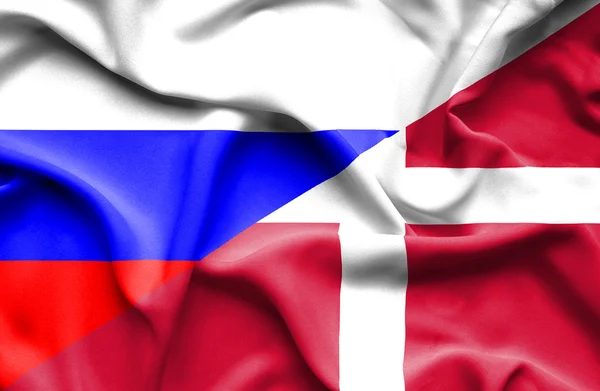 Waving flag of Denmark and Russia — Stock Photo, Image