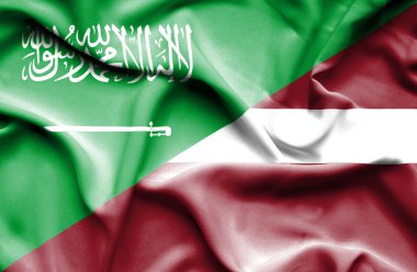 Letonya ve Suudi Arabistan bayrağı sallayarak