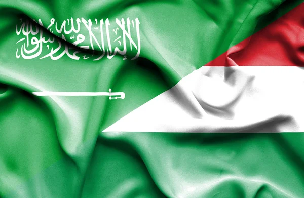 Bandiera sventolante di Ungheria e Arabia Saudita — Foto Stock