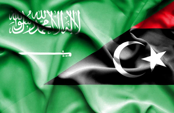 Hullámzó zászlaja Líbia és Szaúd-Arábia — Stock Fotó