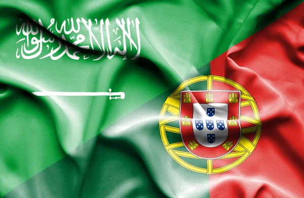 Mávání vlajkou Portugalska a Saúdská Arábie — Stock fotografie