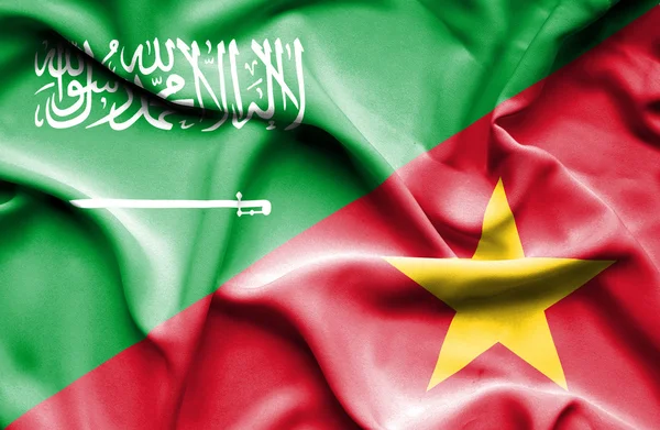 Vlající vlajka Vietnamu a Saúdské Arábie — Stock fotografie