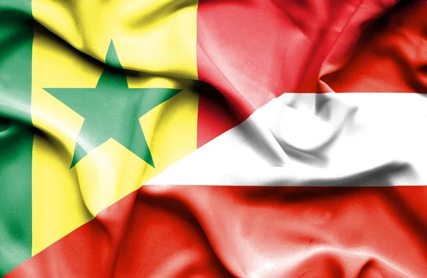 Waving flag of Austria and Senegal — Stock Photo, Image