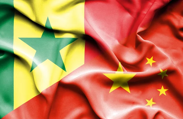 Waving flag of China and Senegal — Stock Photo, Image