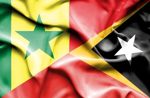 Flagge von Osttimor und Senegal schwenken — Stockfoto