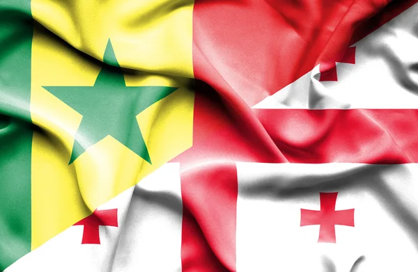 Waving flag of Georgia and Senegal — Stock Photo, Image