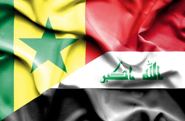 Waving flag of Iraq and Senegal — Stock Photo, Image