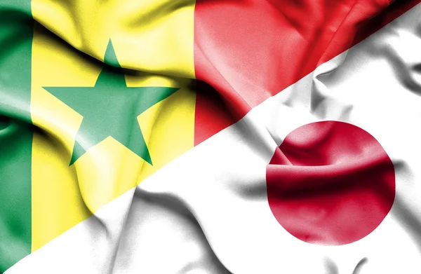 Bandeira ondulada do Japão e Senegal — Fotografia de Stock