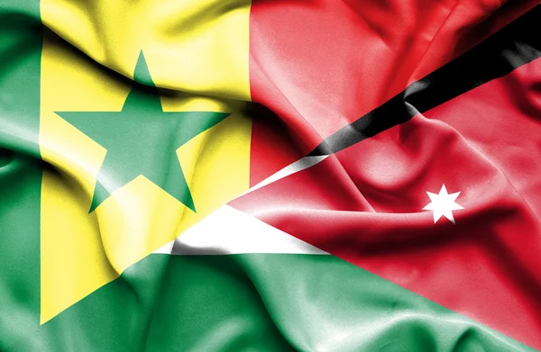 Waving flag of Jordan and Senegal — Stock Photo, Image