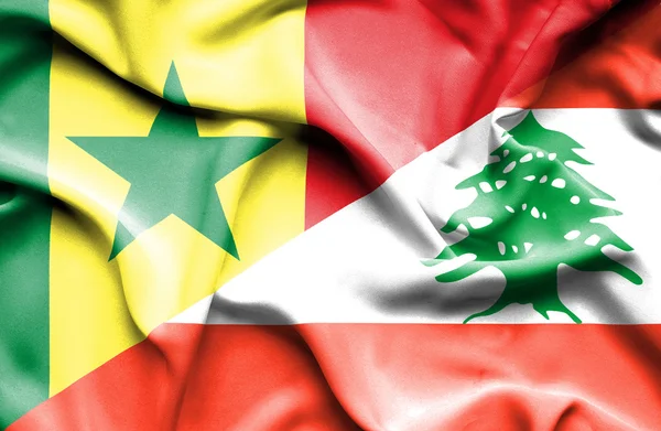 Waving flag of Lebanon and Senegal — Stock Photo, Image