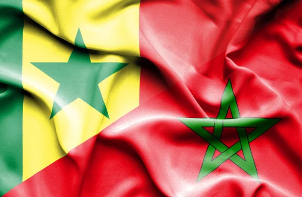 Vlající vlajka Maroka a senegal — Stock fotografie