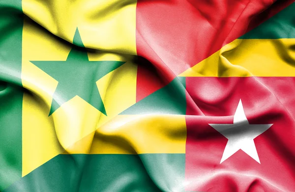 Waving flag of Togo and Senegal — Stock Photo, Image
