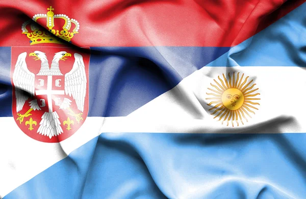 Waving flag of Argentina and Serbia — Stock Photo, Image