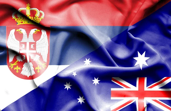 Waving flag of Australia and Serbia — Stock Photo, Image