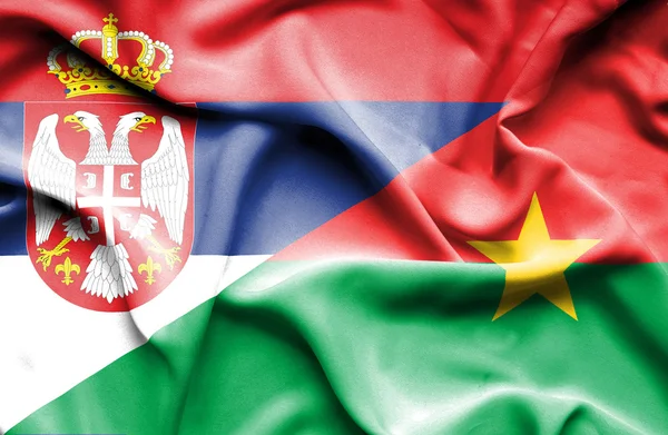 Waving flag of Burkina Faso and Serbia — Stock Photo, Image