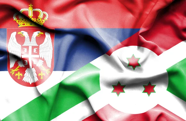 Vlající vlajka burundi a Srbsko — Stock fotografie