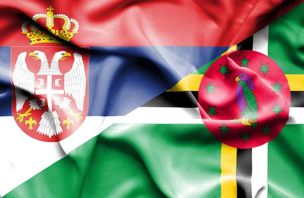 Waving flag of Dominica and Serbia — Stock Photo, Image