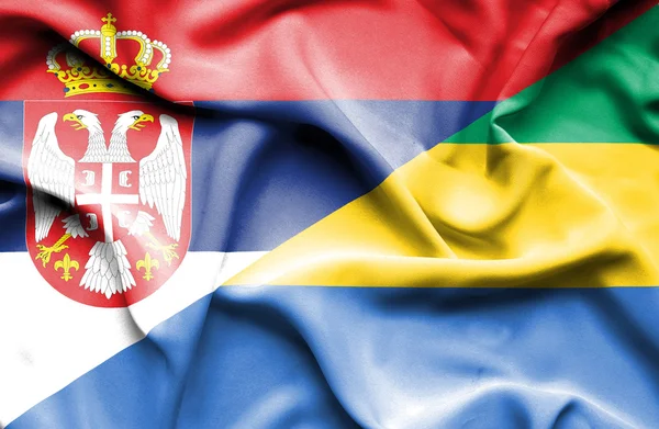 Bandeira ondulada do Gabão e da Sérvia — Fotografia de Stock