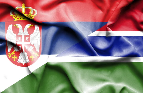 Viftande flagga gambia och Serbien — Stockfoto