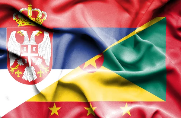 Sventolando bandiera di Guernsey e Serbia — Foto Stock