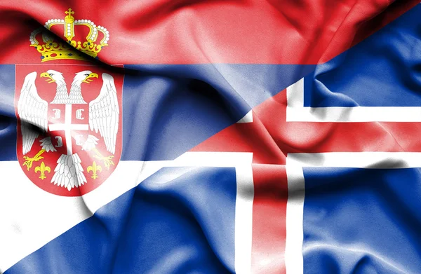 Waving flag of Iceland and Serbia — Stock Photo, Image