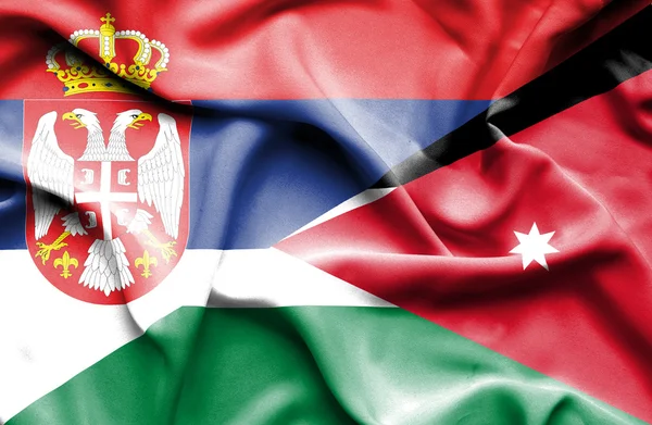 Wapperende vlag van Jordanië en Servië — Stockfoto