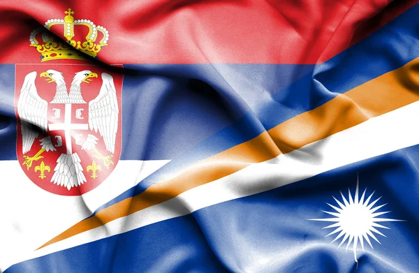 Waving flag of Marshall Islands and Serbia — Stock Photo, Image