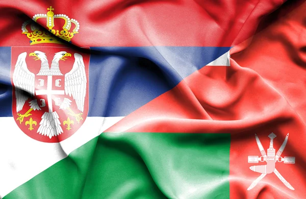 Sventolando bandiera dell'Oman e della Serbia — Foto Stock