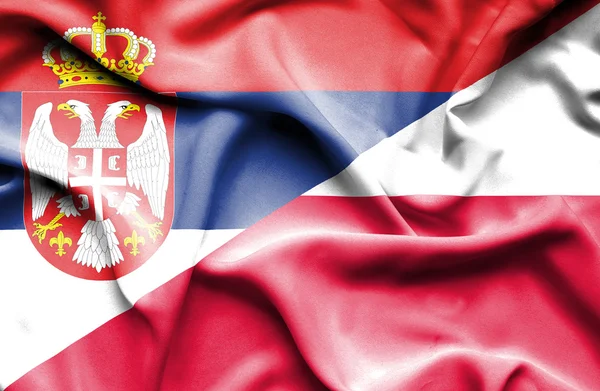 Waving flag of Poland and Serbia — Stock Photo, Image