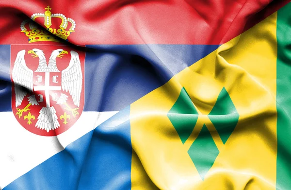 Mávání vlajkou Svatý Vincenc a Grenadiny a Srbsko — Stock fotografie