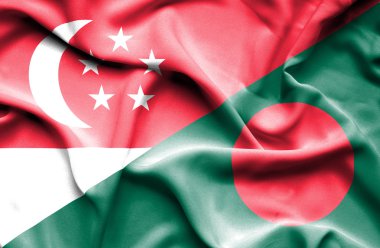 Bangladeş ve Singapur bayrağı sallayarak