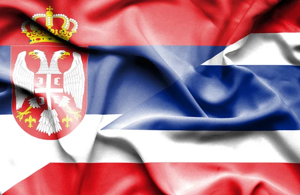 Waving flag of Thailand and Serbia — Stock Photo, Image