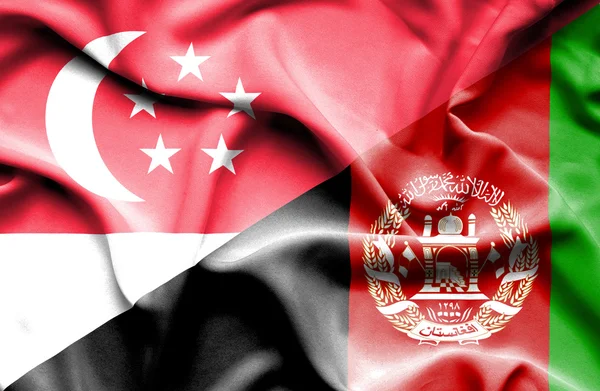 Розмахуючи прапором Афганістану і Сінгапур — стокове фото