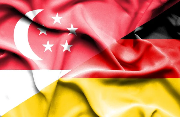 Bandera ondeante de Alemania y Singapur —  Fotos de Stock