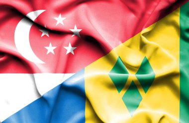 saint vincent ve Grenadinler ve Singapur bayrağı sallayarak