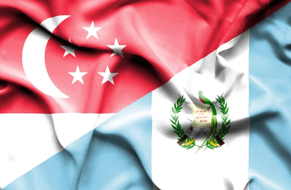 Guatemala och singapore viftande flagga — Stockfoto