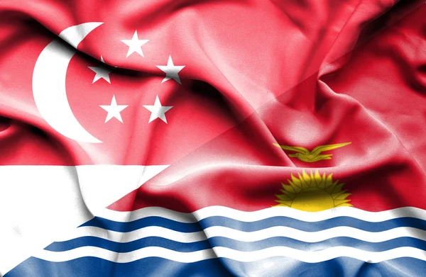 基里巴斯和新加坡那飘扬的旗帜 — 图库照片