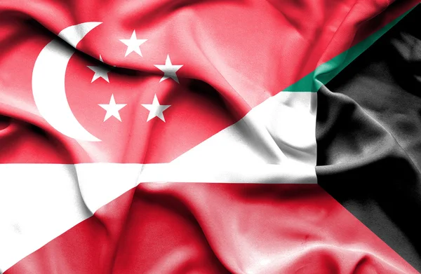 Розмахуючи прапором Кувейт та Сінгапурі — стокове фото