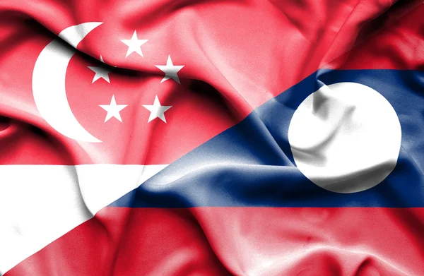 Machać flaga Laosu i Singapuru — Zdjęcie stockowe