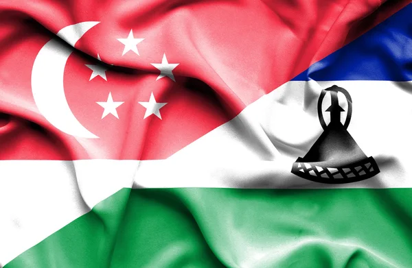 Bandera ondeante de Lesotho y Singapur —  Fotos de Stock