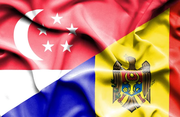 Waving flag of Moldavia and Singapore — Stock Photo, Image