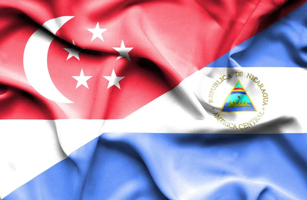 Drapeau du Nicaragua et de Singapour — Photo