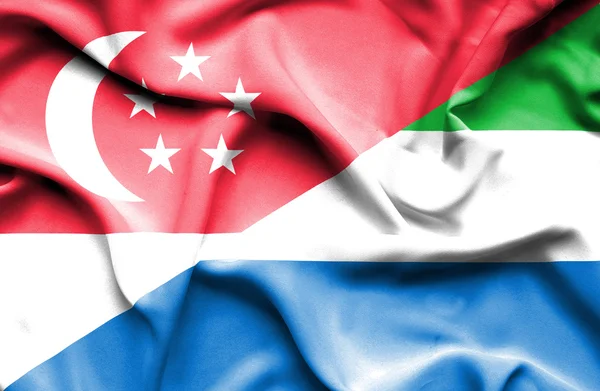 Bandera ondeante de Sierra Leona y Singapur — Foto de Stock