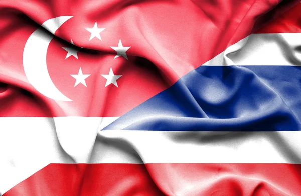 Machać flaga Tajlandii i Singapurze — Zdjęcie stockowe
