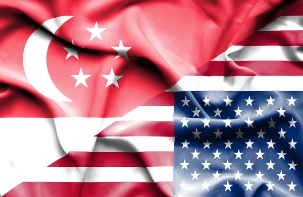 Bandera ondeante de Estados Unidos de América y Singapur —  Fotos de Stock