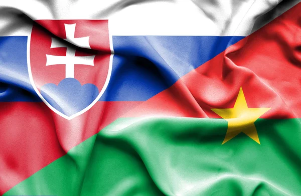 Bandeira acenando de Burkina Faso e Eslováquia — Fotografia de Stock