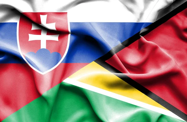 Viftande flagga guyana och Slovakien — Stockfoto